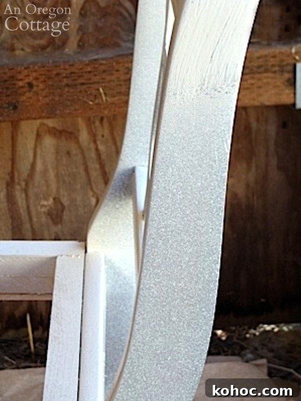 Pro Tips for Painting with an Affordable Handheld Paint Sprayer 5 Using Paint Sprayer-closeup of bench paint