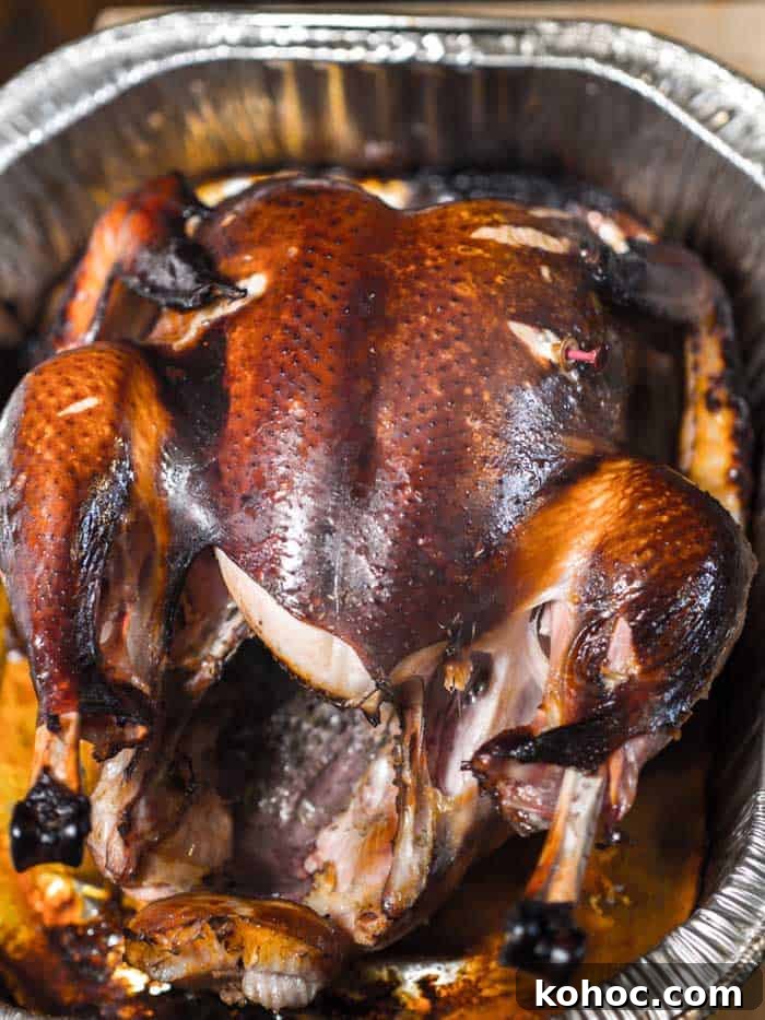 bbq-smoked-turkey-in-foil-tray pellet smoked turkey