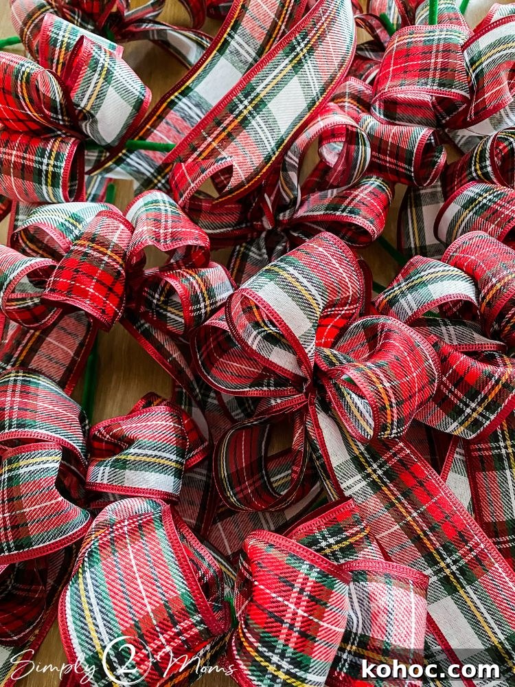 Create Fluffy Christmas Bows in 5 Simple Steps 13 A group of plaid ribbon bows for Christmas decorating