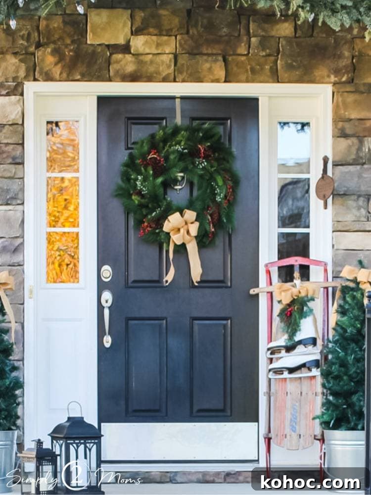 Create Fluffy Christmas Bows in 5 Simple Steps 14 front door with Christmas wreath and burlap bow hung vintage sled and skates leaning on door