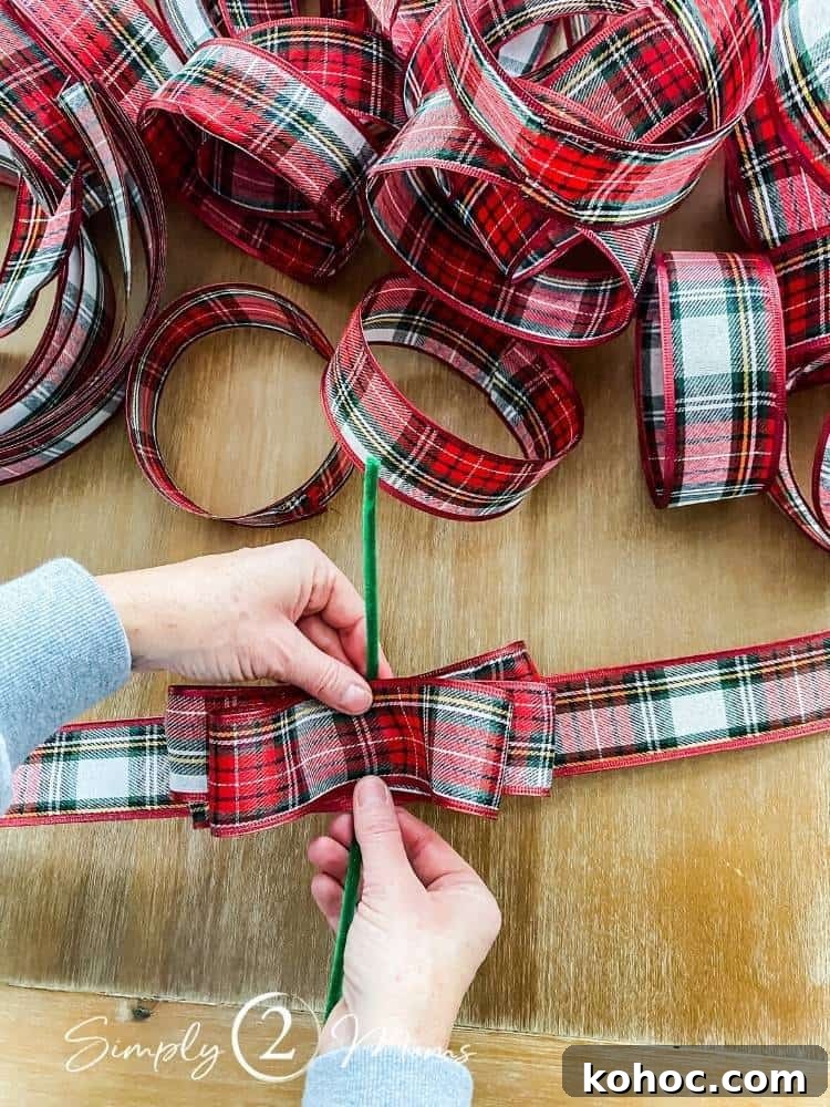 Create Fluffy Christmas Bows in 5 Simple Steps 7 hands holding ribbon pieces and pipe cleaner assembling fluffy bow