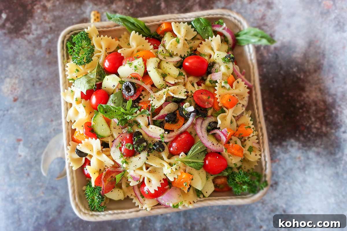 30 Top Gluten-Free Recipes from 2023 You’ll Want to Try 8 best summer pasta salad with olives, tomatoes, onions and herbs in a bowl