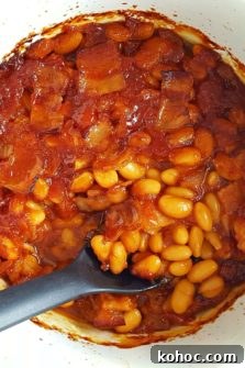 Classic Homestyle Baked Beans Recipe for Comforting Sides 7 Homestyle Baked Beans in a casserole dish.