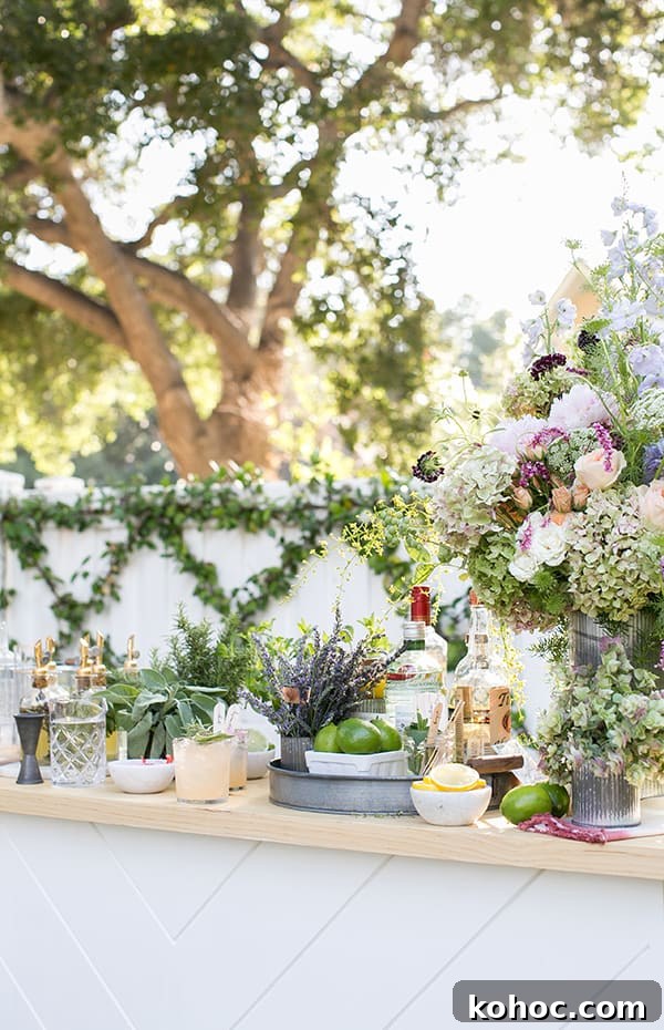 Garden Cocktail Party: Mix & Match Refreshment Bar Ideas 3 Whimsical garden cocktail bar setting with tons of flowers, herbs, limes, lemons and spirits.