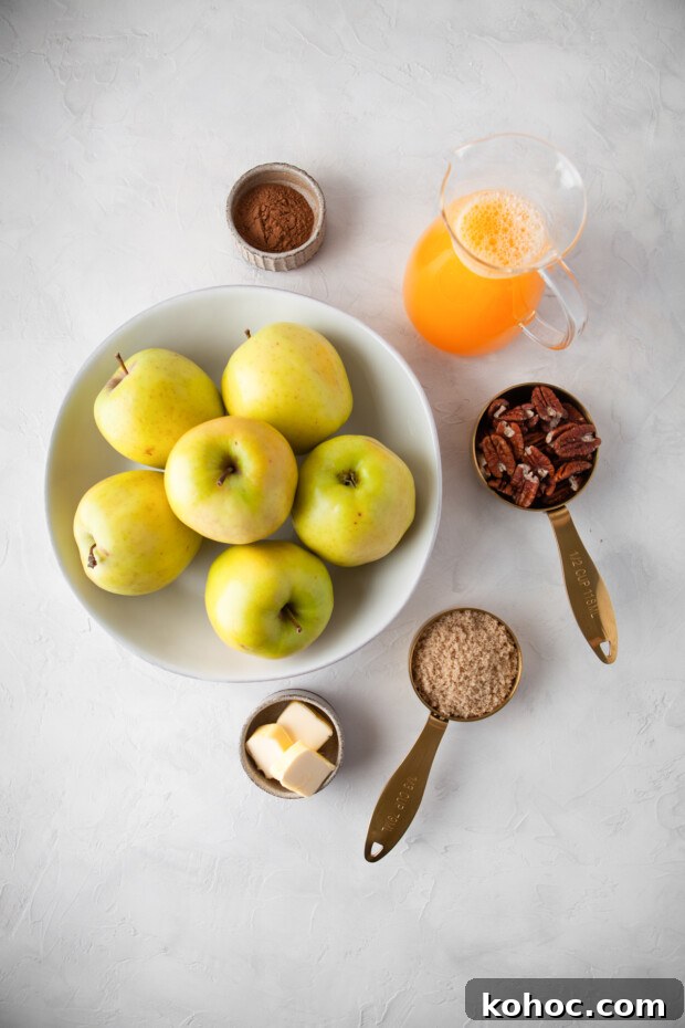 Cinnamon Baked Apples ingredients on a table. 