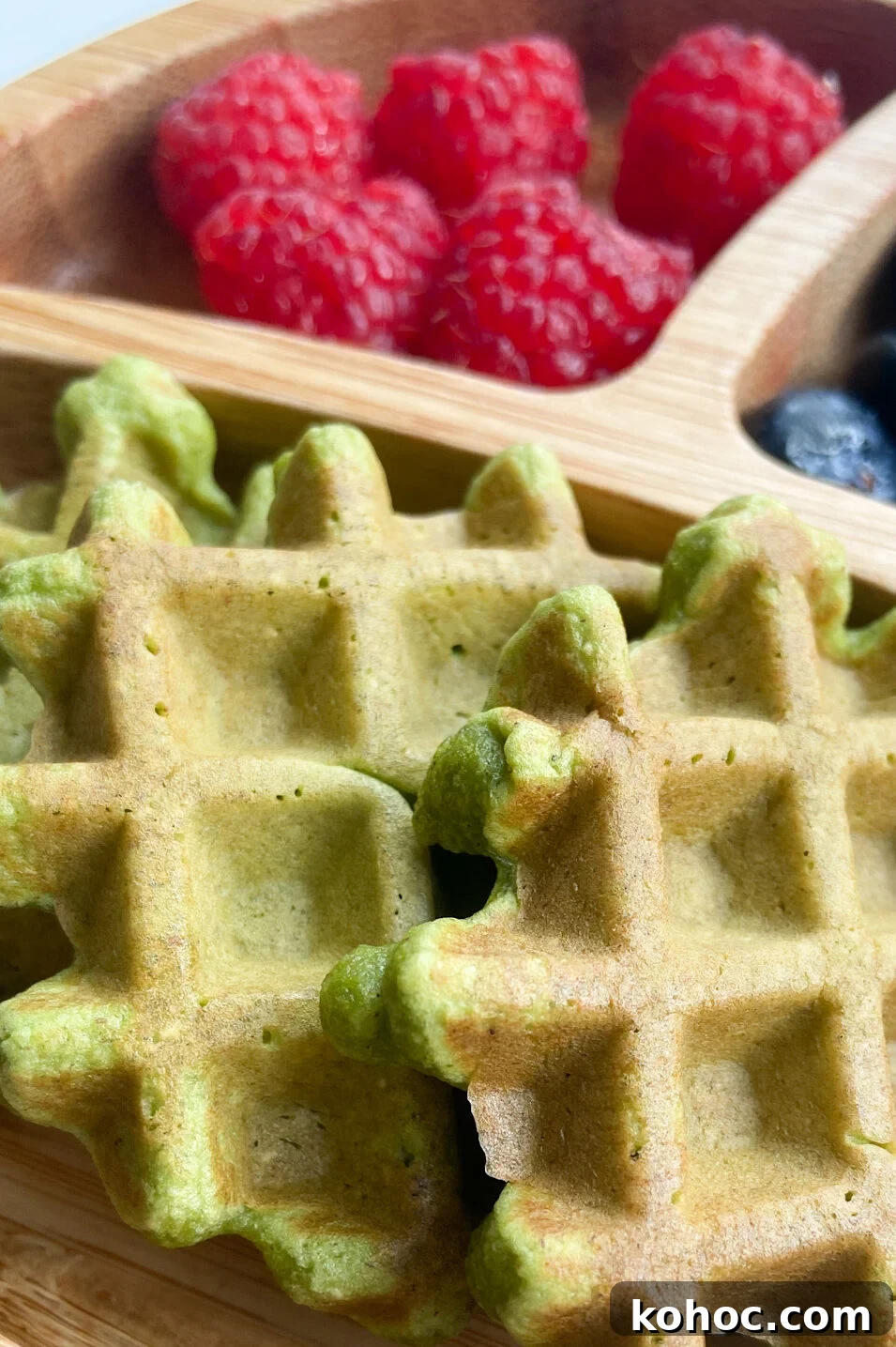 Green Spinach Banana Waffles Recipe | Fluffy & Nutritious Breakfast 5 Spinach banana waffles served with raspberries and blueberries