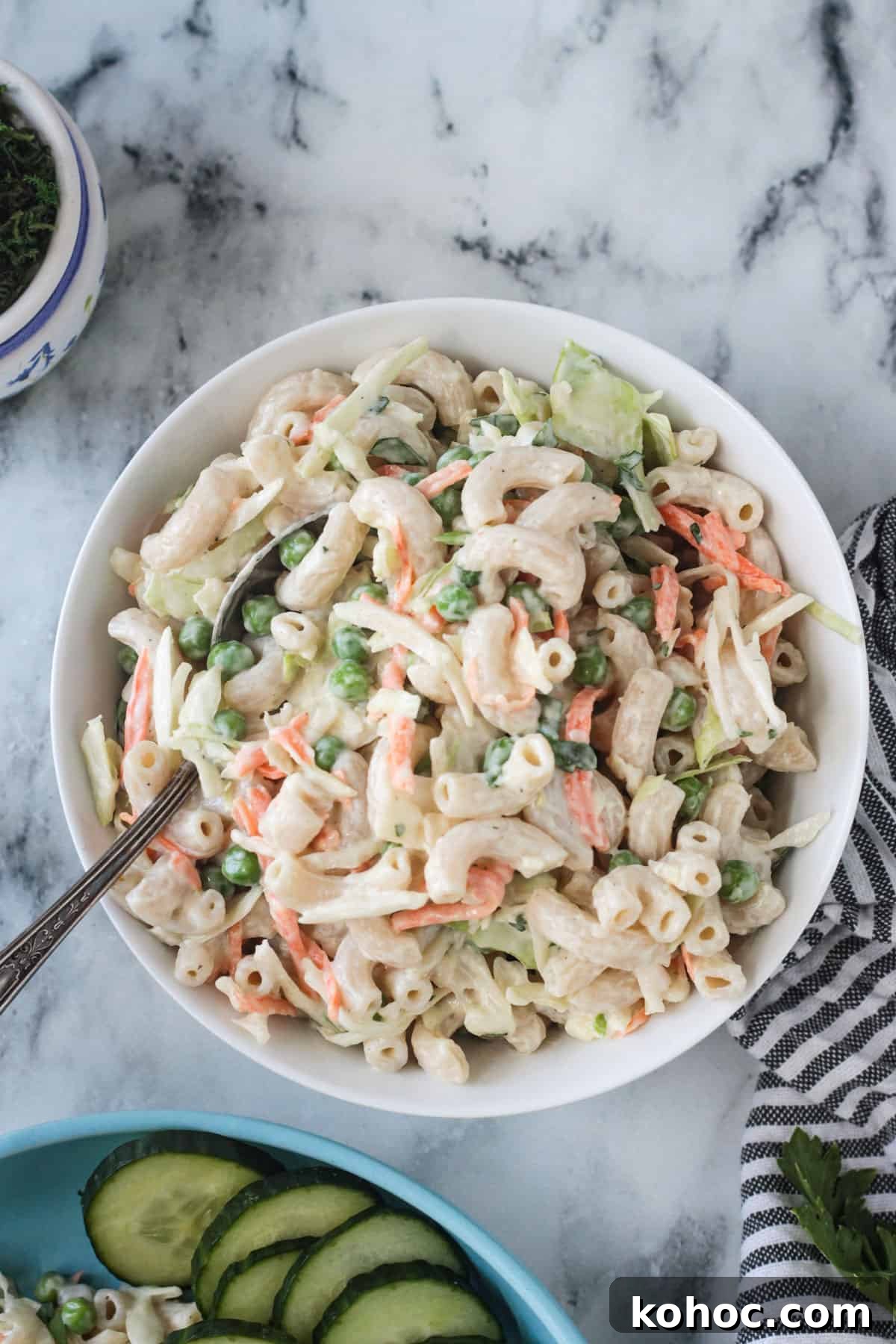 Creamy No-Chop Vegan Macaroni Salad for Quick Meals 6 Bowl of vegan macaroni salad mixed with coleslaw.