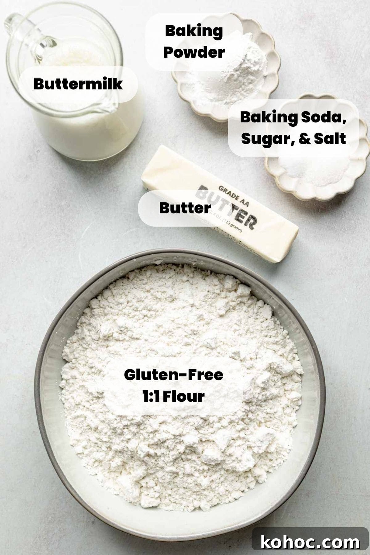 Tender Fluffy Gluten-Free Drop Biscuits Recipe for Perfect Results 3 Gluten free flour and other ingredients measured out in bowls next to a stick of butter.