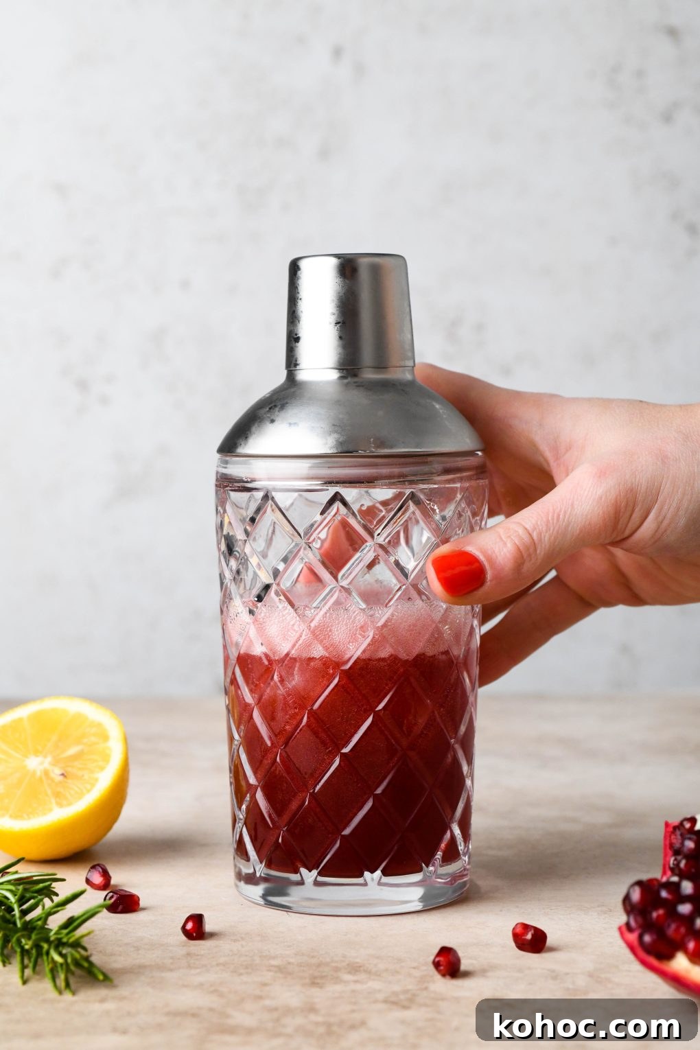 Pomegranate Champagne Cocktail with Gin or Vodka for Holidays 10 How to make Festive Pomegranate Champagne Cocktail: Cocktail shaken in cocktail shaker.