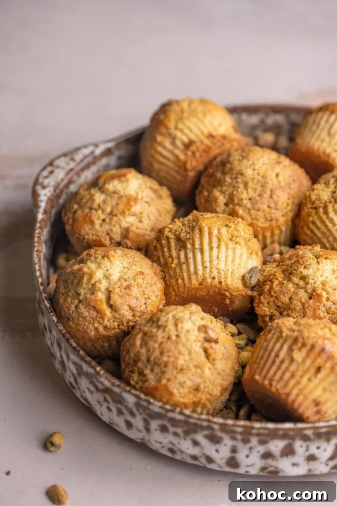 Dish filled with just-baked Pistachio Muffins