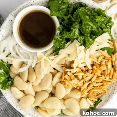 Butter bean and kale salad with almonds and onions.