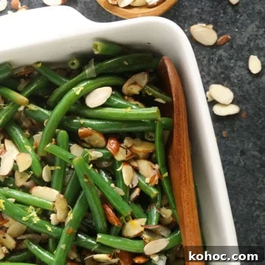 Green beans almondine with slivered almonds.