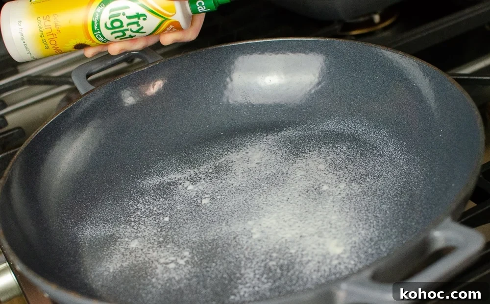 Curried Beef Mince Hotpot Recipe for Comforting Family Dinners 12 Spraying fry light oil into our cast iron dish