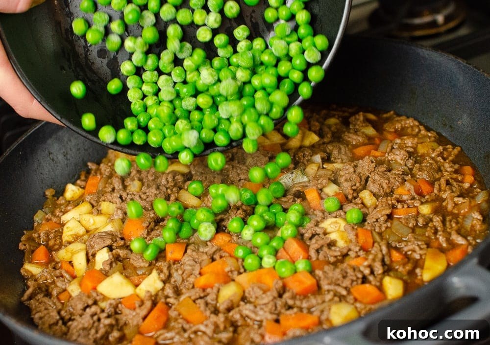 Curried Beef Mince Hotpot Recipe for Comforting Family Dinners 17 peas added to mince