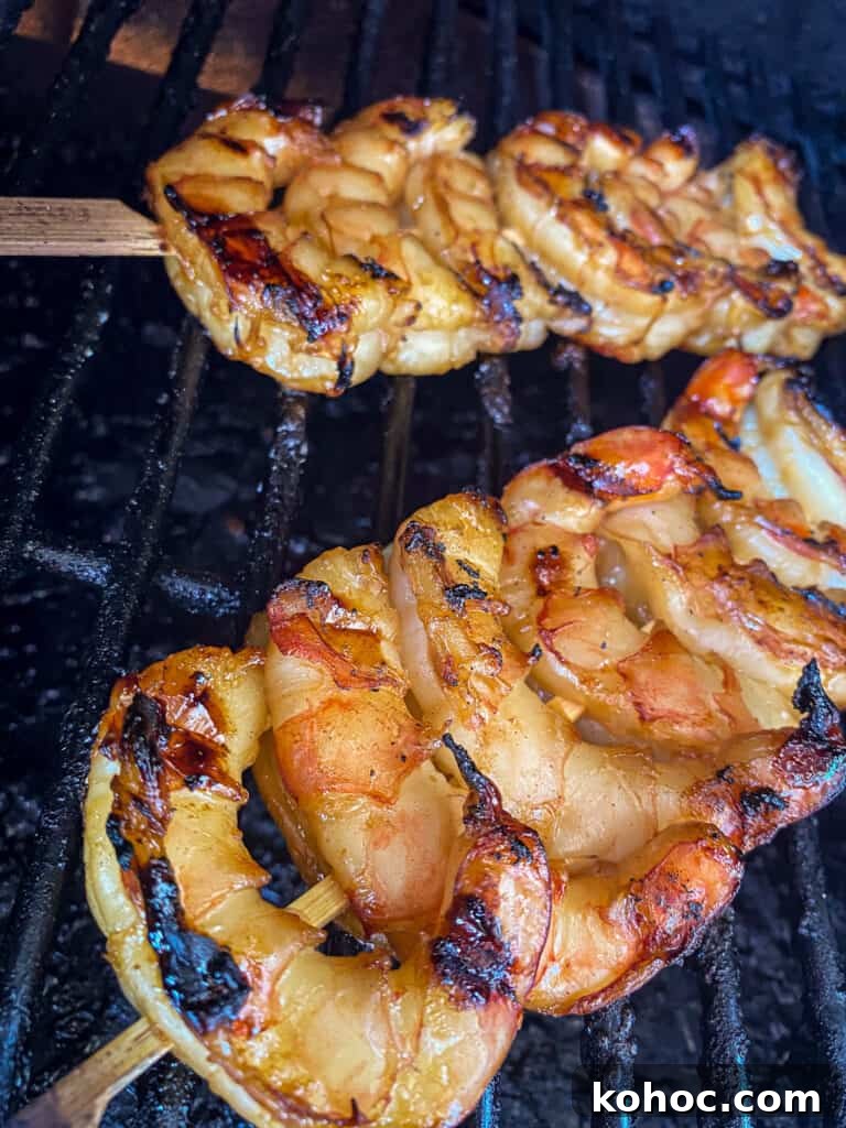 10-Minute Sweet Spicy Shrimp Recipe for Weeknight Dinners 4 ten minute sweet and spicy shrimp skewers on a grill