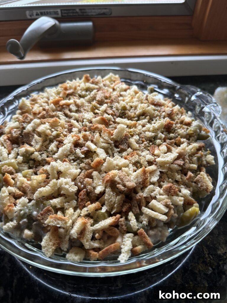 Thanksgiving Dinner Ideas Using Dollar Tree Finds 4 Green bean casserole in a glass bowl.