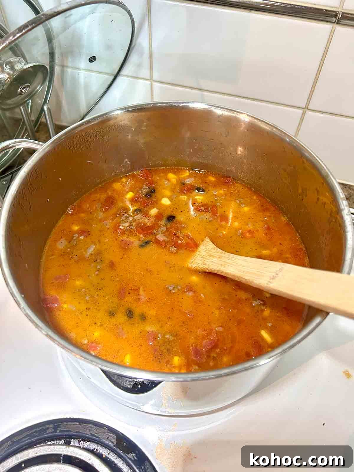 Creamy Chicken Taco Soup Recipe for Cozy Weeknight Meals 7 beans, corn, and heavy cream stirred into soup.