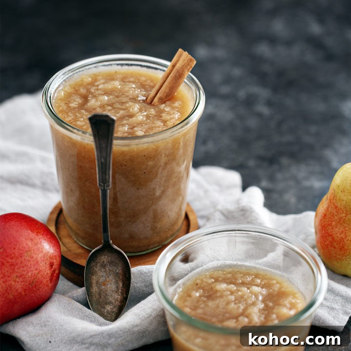 Homemade Pear Sauce Recipe: Smooth, Sweet, and Simple 9 jar of pear sauce and a spoon
