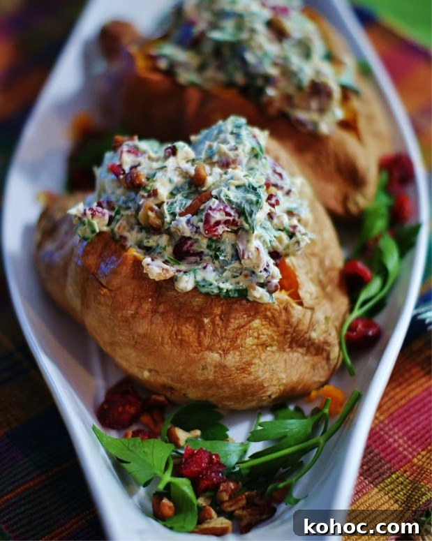 2 Stuffed sweet potatoes on a white dish
