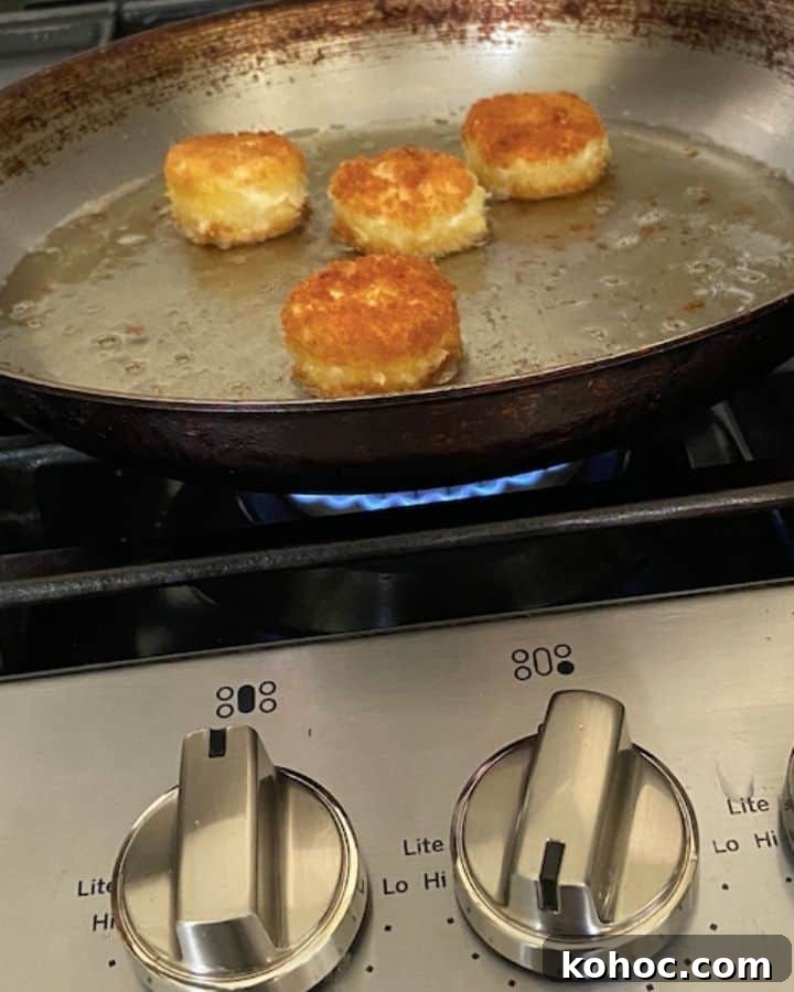 frying goat cheese in a pan on medium high heat