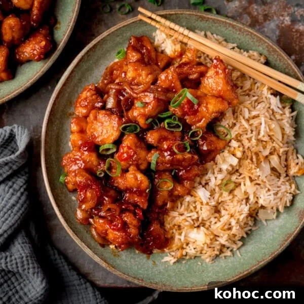 Plate of Crispy Chilli Chicken with rice.