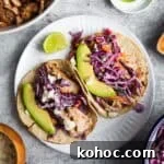 Slow-Cooker Shredded Chipotle Chicken Recipe for Tacos & Bowls 10 two tortillas filled with slow cooker shredded chipotle chicken