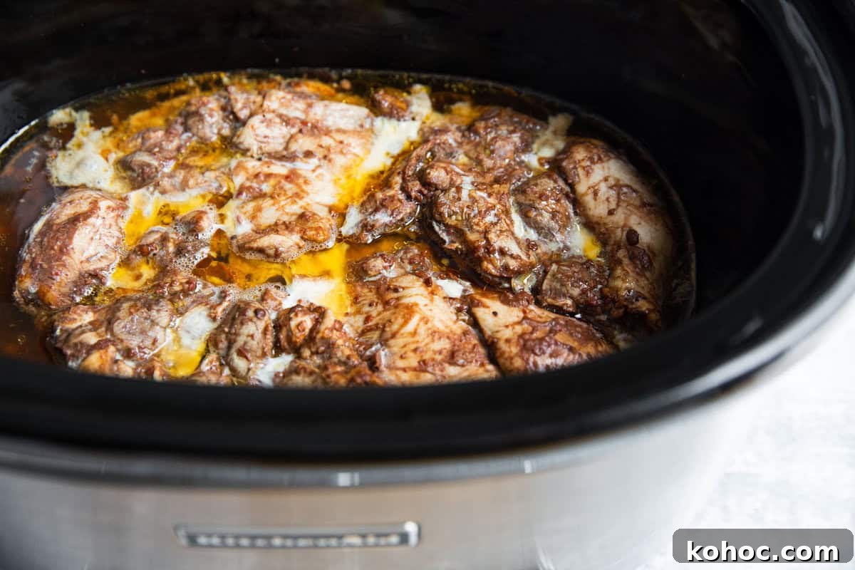 Slow-Cooker Shredded Chipotle Chicken Recipe for Tacos & Bowls 6 chipotle chicken recipe in a slow cooker