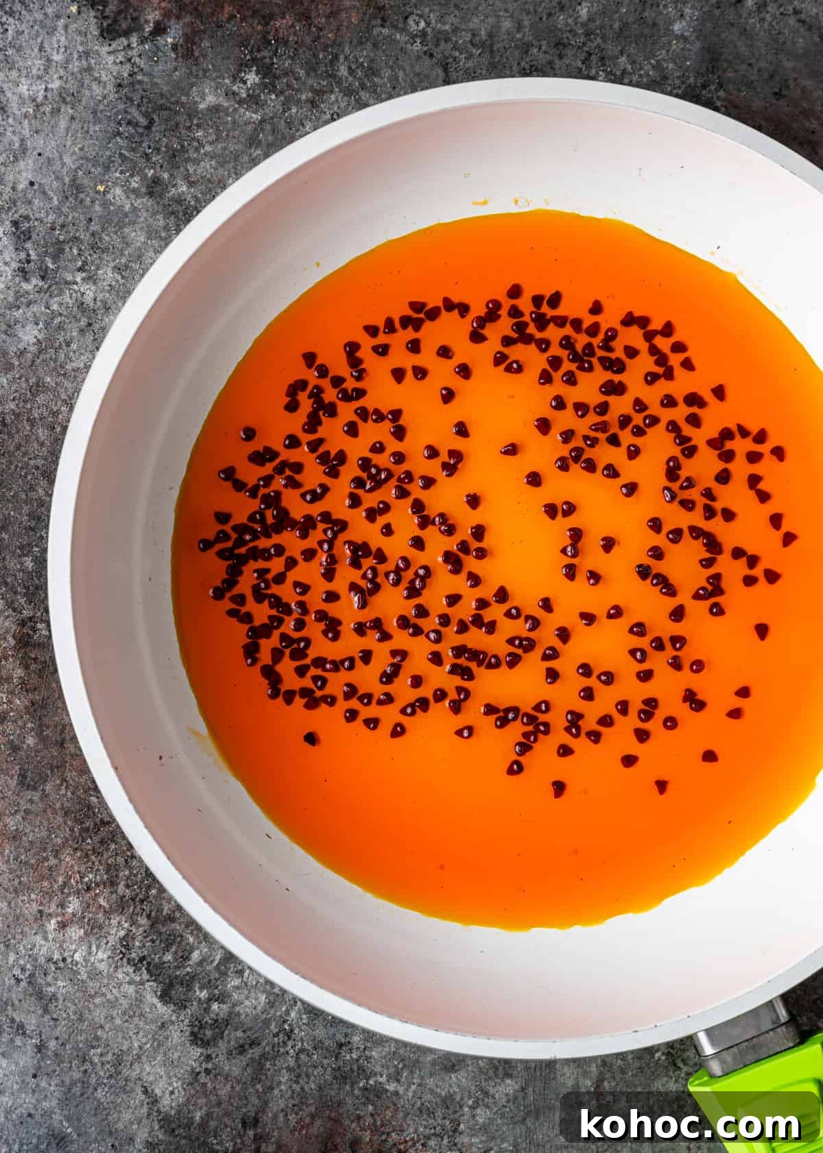 Achiote and Annatto: Homemade Paste and Oil Recipes 5 annatto seeds steeped in oil in frying pan