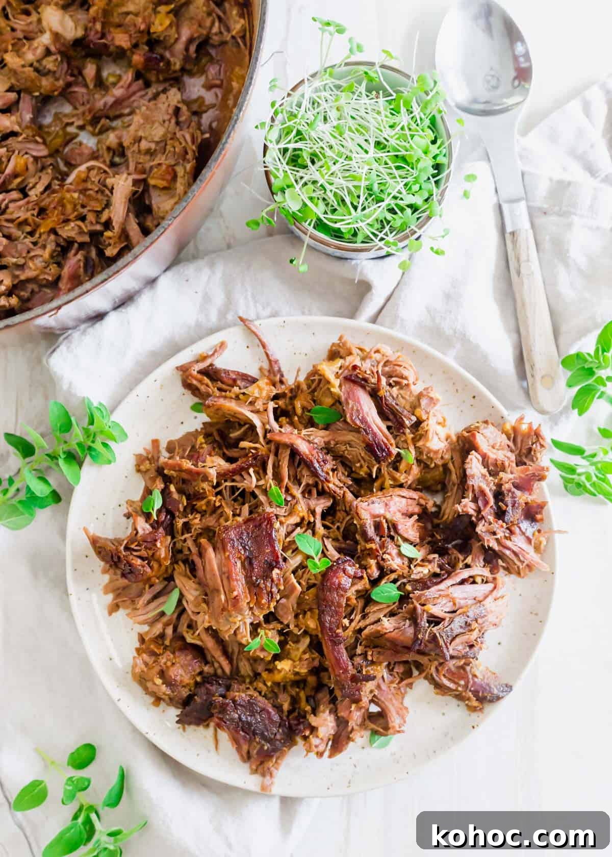 Shredded braised leg of lamb using boneless leg of lamb in Dutch oven after 3 hours. Shredded braised leg of lamb using boneless leg of lamb in Dutch oven after 3 hours.