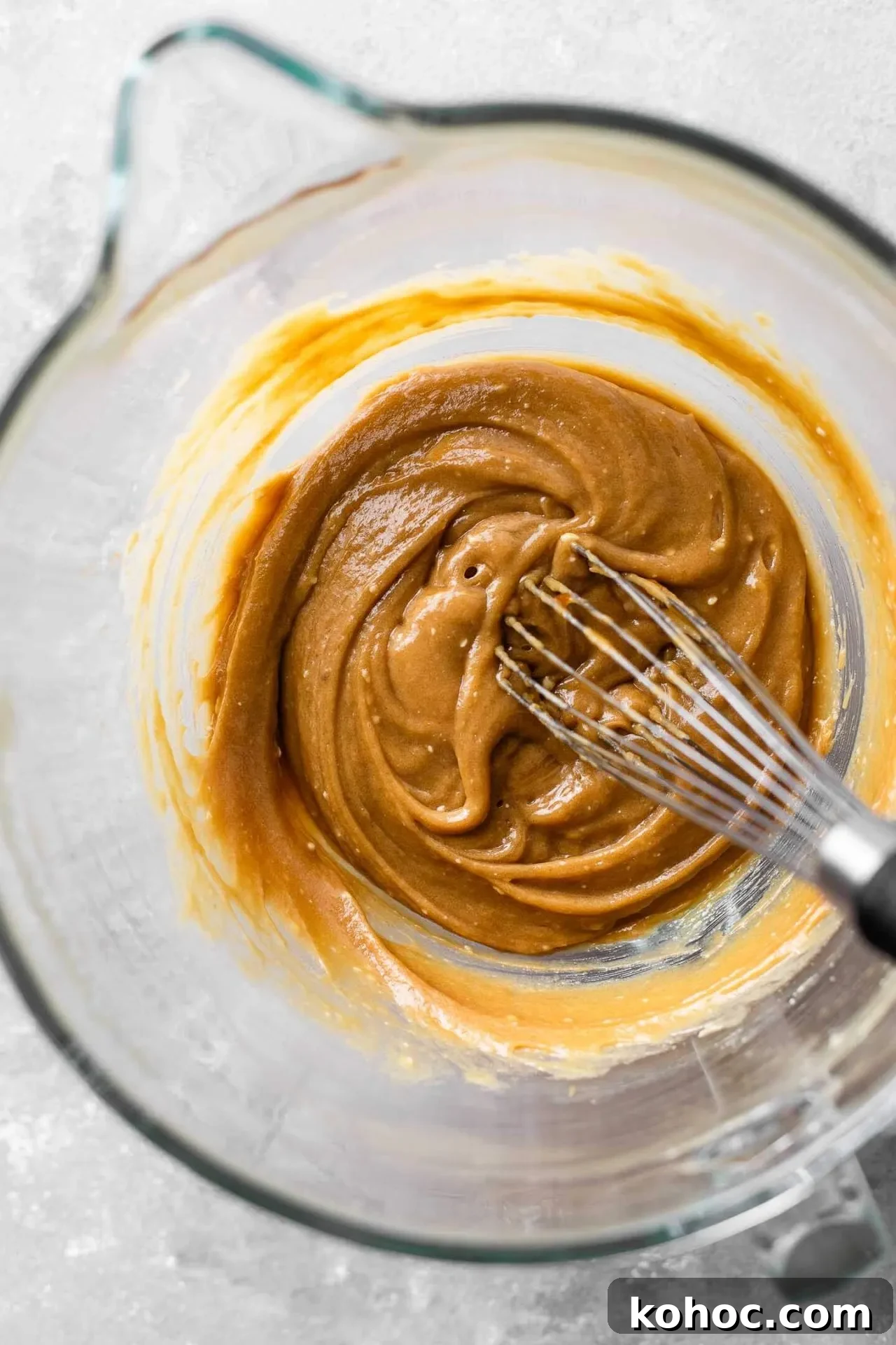 Caramel Gingerbread Cake with Silky Whipped Caramel Icing 8 caramel gingerbread cake wet ingredients whisked together in bowl