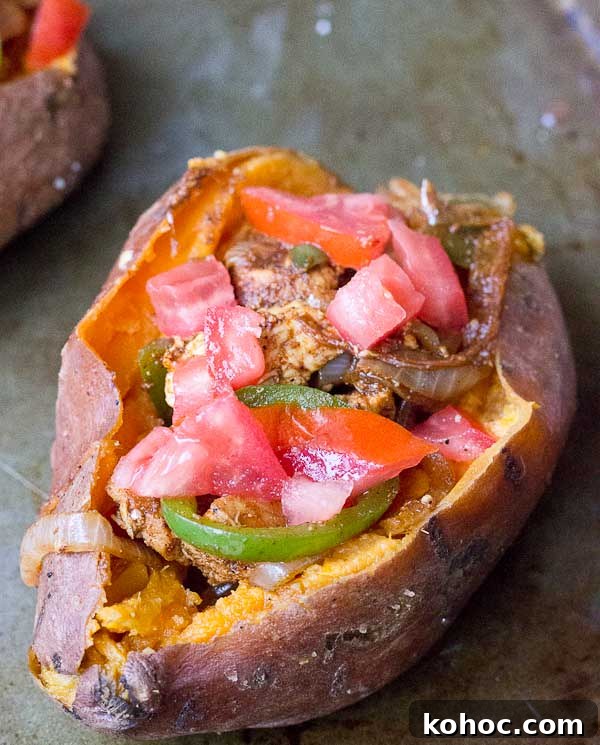 Baked sweet potato stuffed with chicken fajita filling