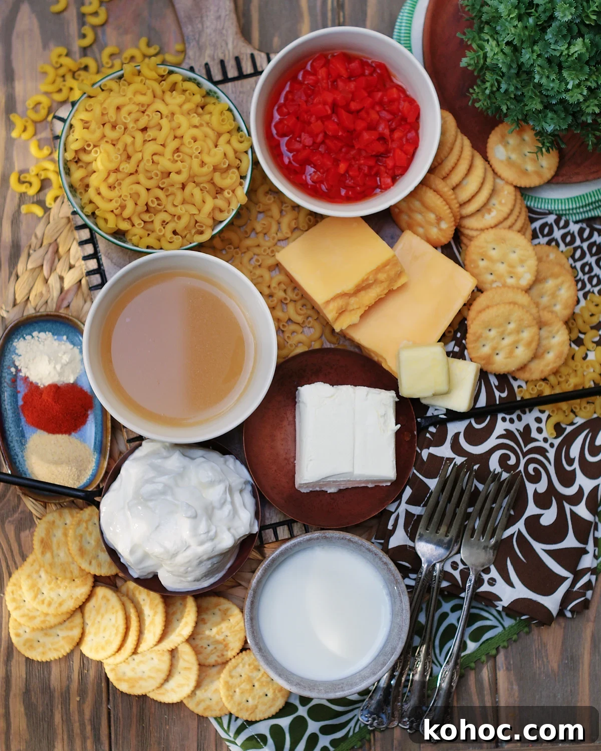 Southern Pimento Mac and Cheese Recipe with Creamy Cheese Sauce 4 The ingredients to make southern pimento macaroni and cheese include cream cheese, cheddar cheese, diced pimentos, sour cream and elbow macaroni
