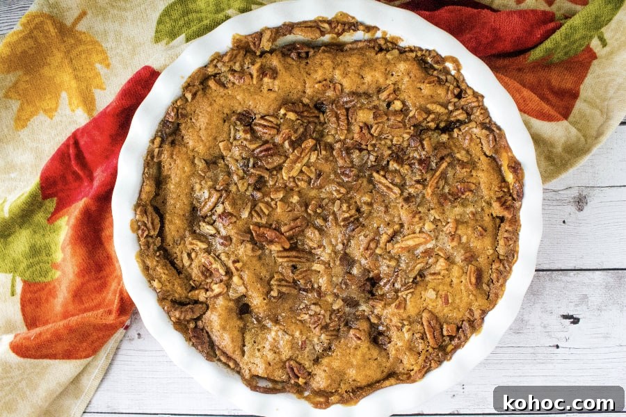 Irresistible Pumpkin Cobbler Recipe for Fall Gatherings 3 baked pumpkin cobbler topped with pecans