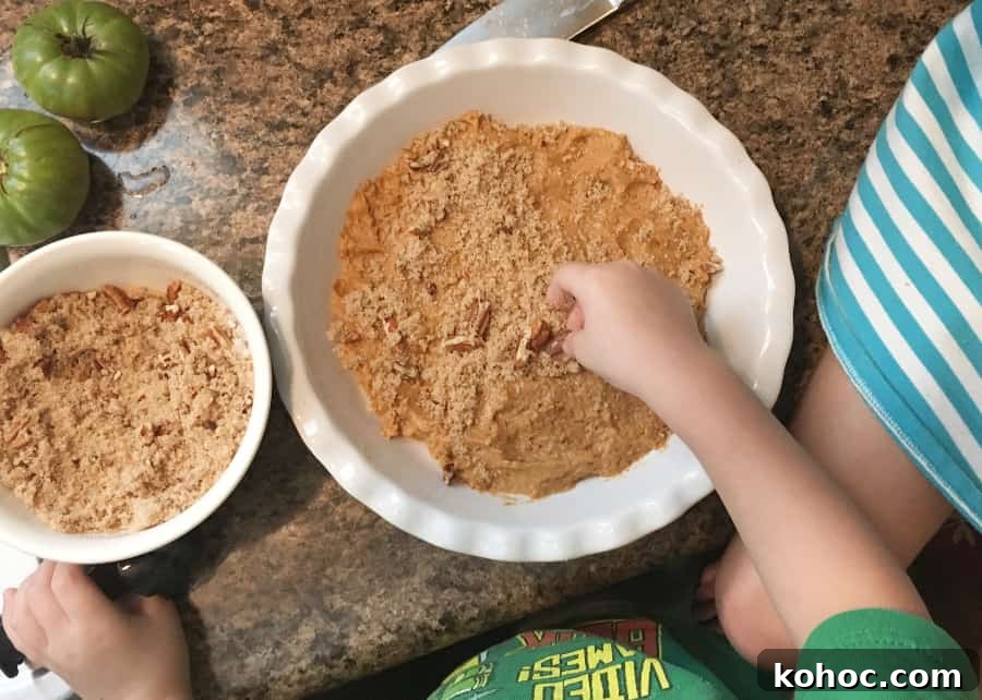 Irresistible Pumpkin Cobbler Recipe for Fall Gatherings 5 kids helping to assemble a pumpkin cobbler