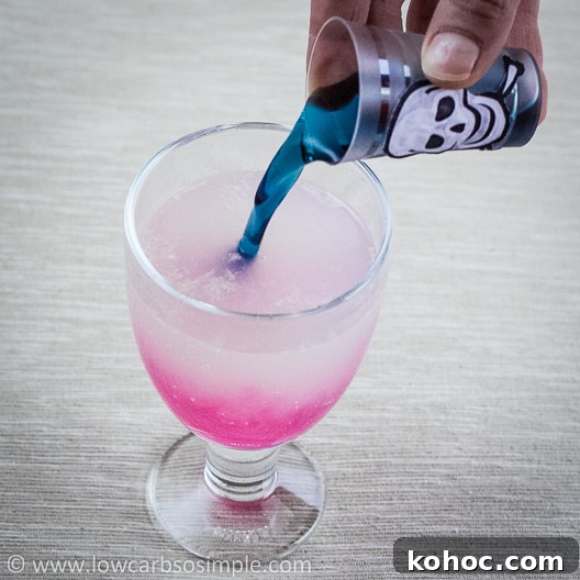 Vegan Color-Changing Witches' Brew Halloween Punch 13 Witches' Brew -- Color Changing Halloween Drink; Pouring the Drink 2 | Low-Carb, So Simple!