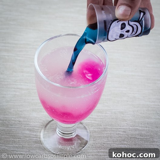 Vegan Color-Changing Witches' Brew Halloween Punch 14 Witches' Brew -- Color Changing Halloween Drink; Pouring the Drink 3 | Low-Carb, So Simple!