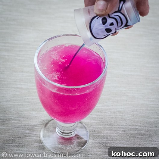 Vegan Color-Changing Witches' Brew Halloween Punch 15 Witches' Brew -- Color Changing Halloween Drink; Pouring the Drink 4 | Low-Carb, So Simple!