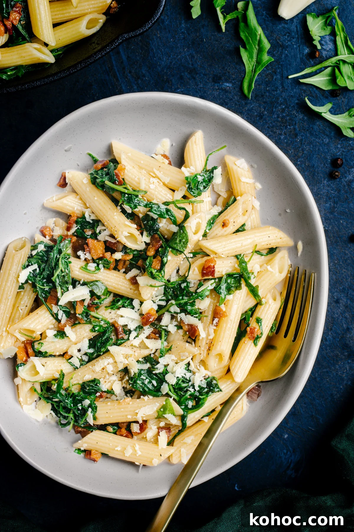 Creamy Pancetta Pasta with Parmesan and Peas 2 Pancetta Pasta served in a white bowl and photographed from the top.