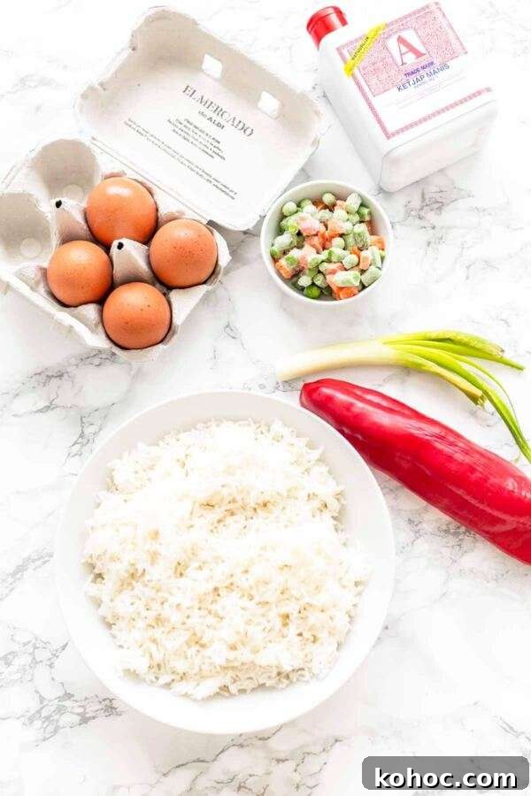 Crispy Air Fryer Fried Rice Recipe for Quick Weeknight Meals 4 Ingredients for making fried rice in an Air Fryer.