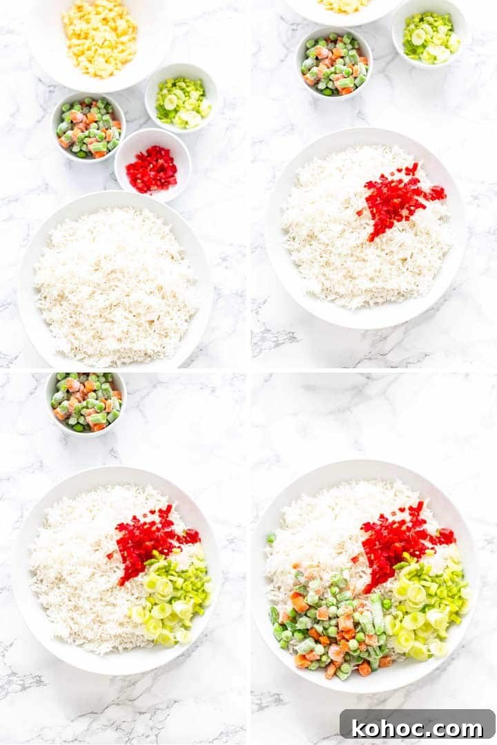 Crispy Air Fryer Fried Rice Recipe for Quick Weeknight Meals 5 Filling Air Fryer fried rice with peas, green beans, carrots, onion, scallion, red bell pepper and scrambled egg.