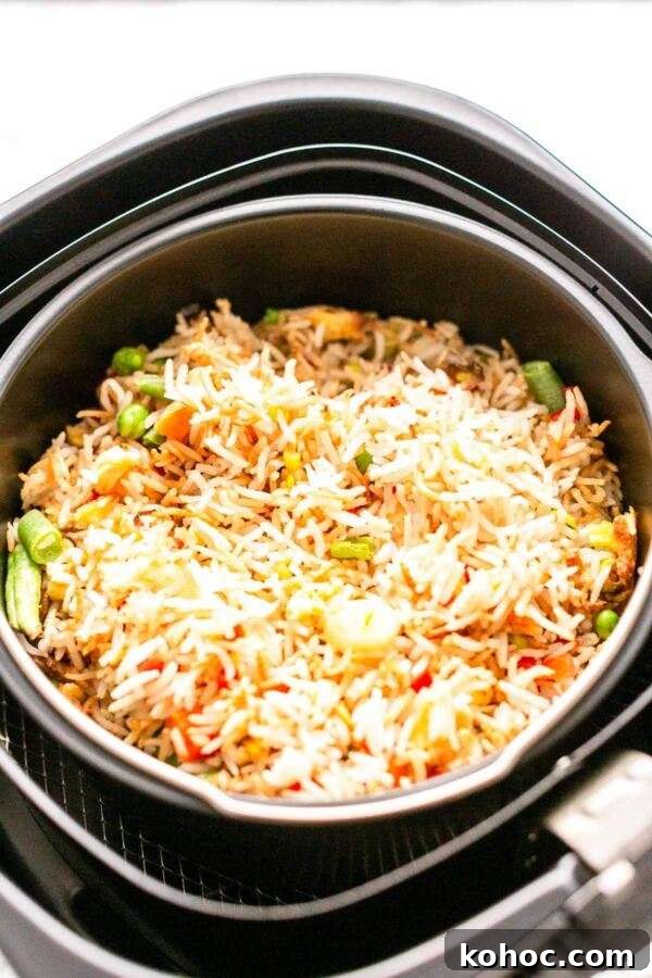 Crispy Air Fryer Fried Rice Recipe for Quick Weeknight Meals 10 Tasty fried rice in a barrel inside an Air Fryer. Easy to make and on the table in no time.