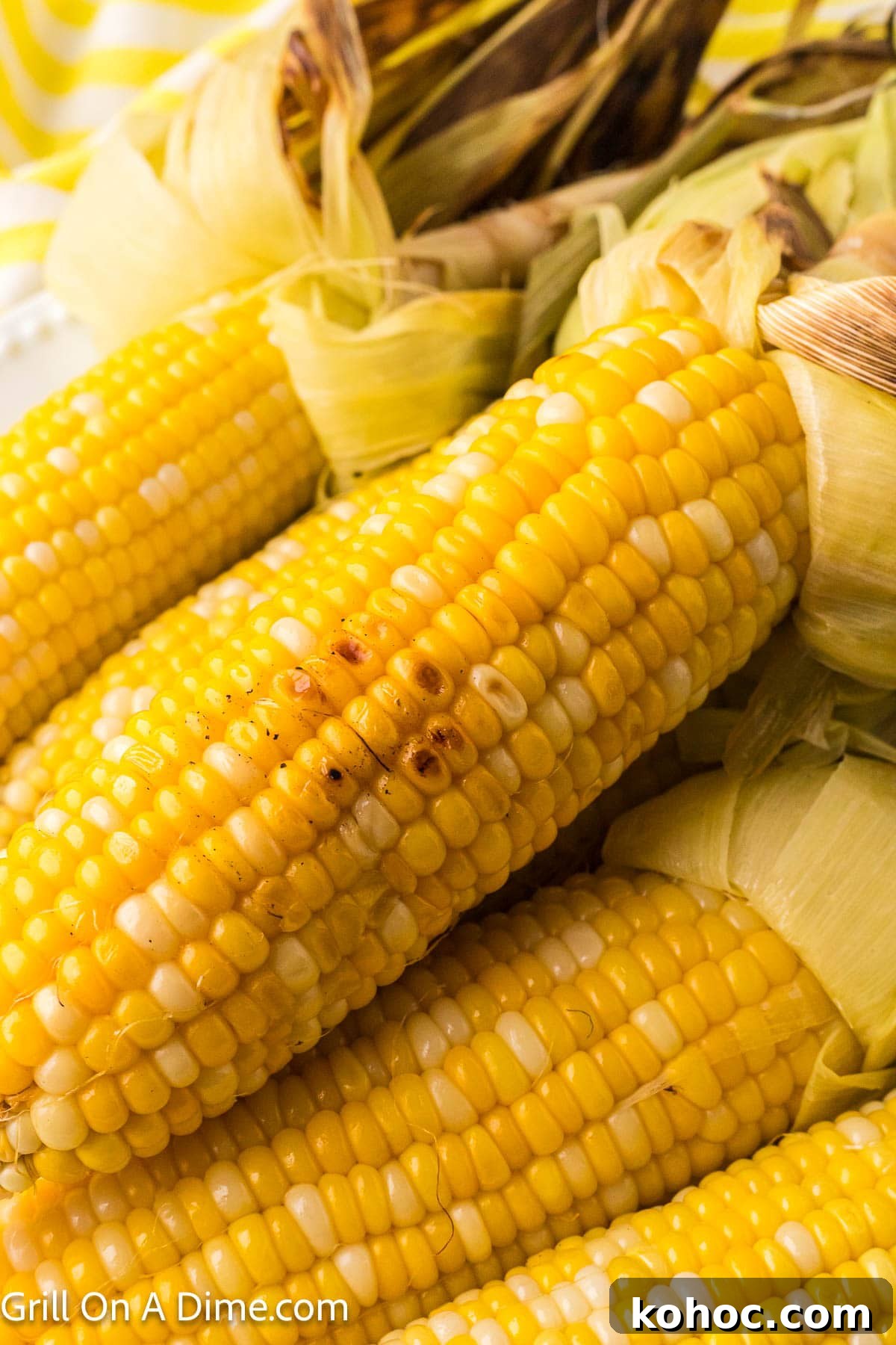 Blackstone Grilled Corn on the Cob in the Husk - Juicy BBQ Flavor 7 Charred corn on the cob with the husk removed