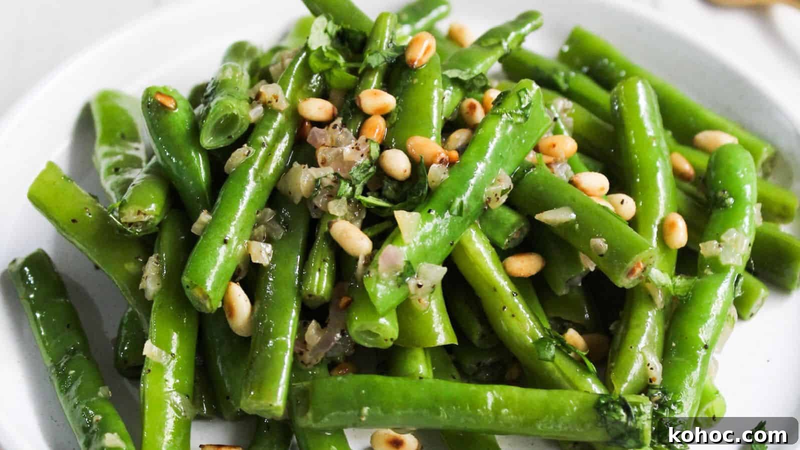 25 Skillet Meals Ready in 30 Minutes or Less 22 Green beans with pine nuts on a plate.