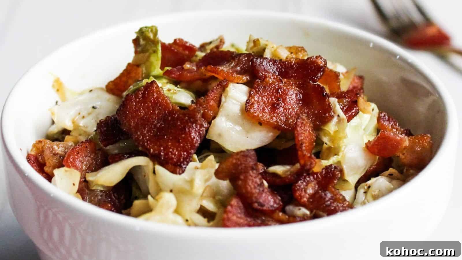 25 Skillet Meals Ready in 30 Minutes or Less 6 Cabbage and bacon in white serving bowl.