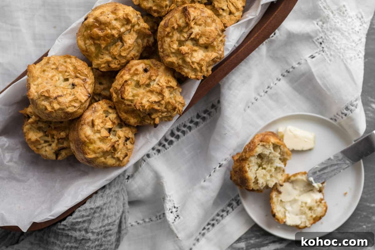 Passover-Friendly Muffins: Simple Recipe for the Seder 2 farfel muffins in a basket with one getting buttered on small plate