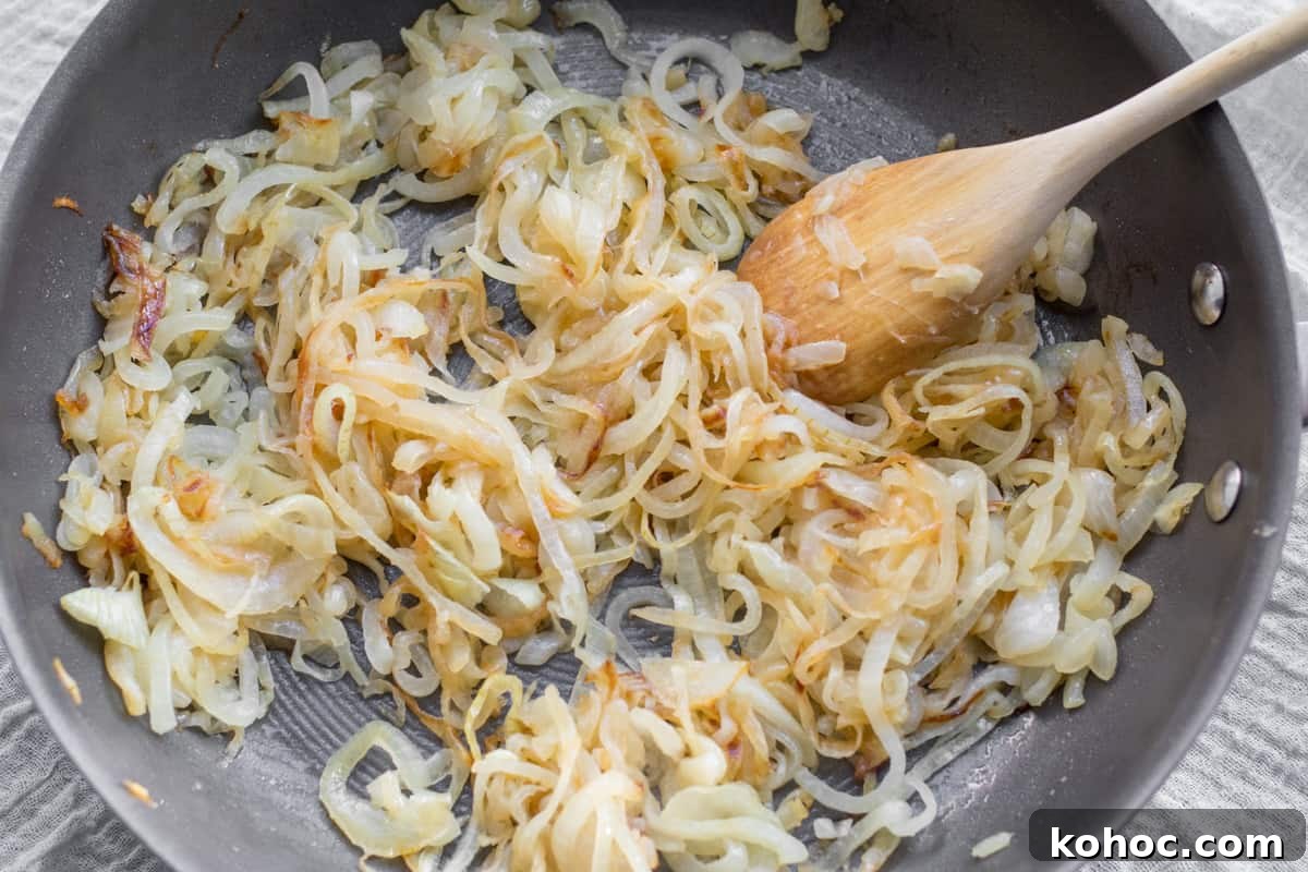 Passover-Friendly Muffins: Simple Recipe for the Seder 7 onions caramelizing in a saute pan