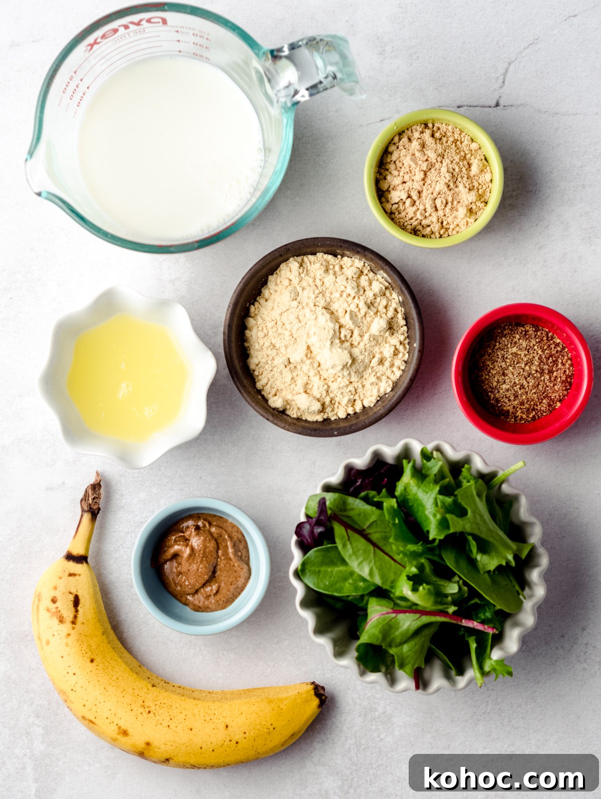Aerial photo of ingredients to make an egg white peanut butter breakfast smoothie.