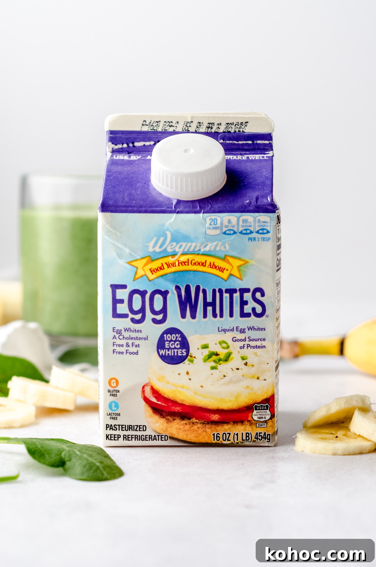 A carton of egg whites on a surface.