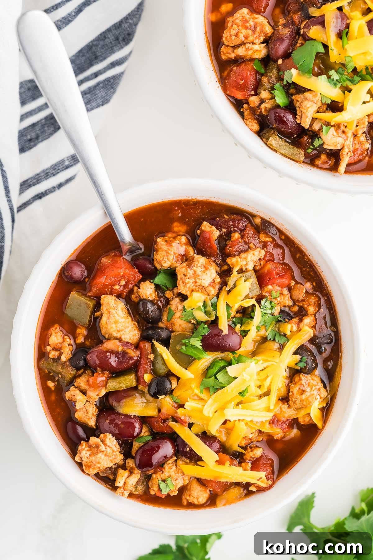 Hearty Ground Chicken Chili Recipe for Weeknight Dinners 2 Ground chicken chili in a bowl, overhead photograph.