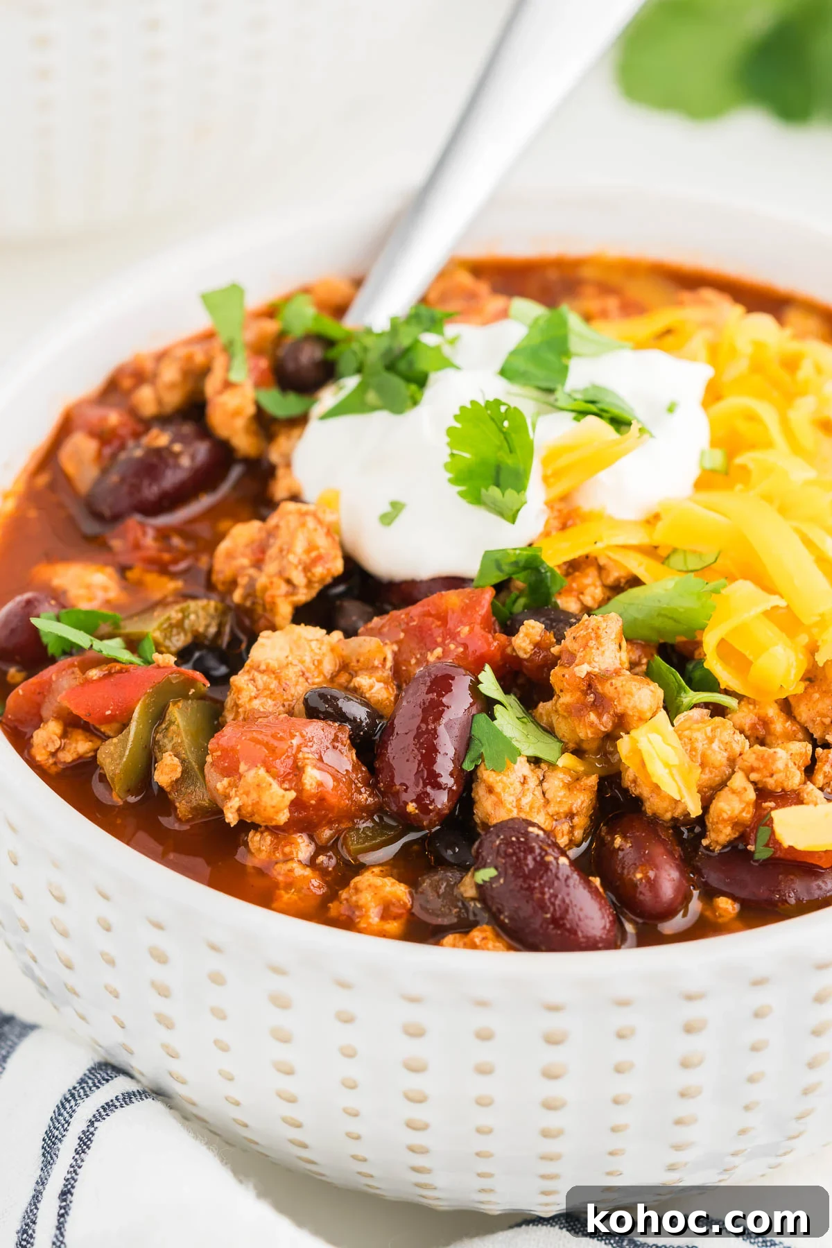 Hearty Ground Chicken Chili Recipe for Weeknight Dinners 9 macro photo of chili with ground meat and beans